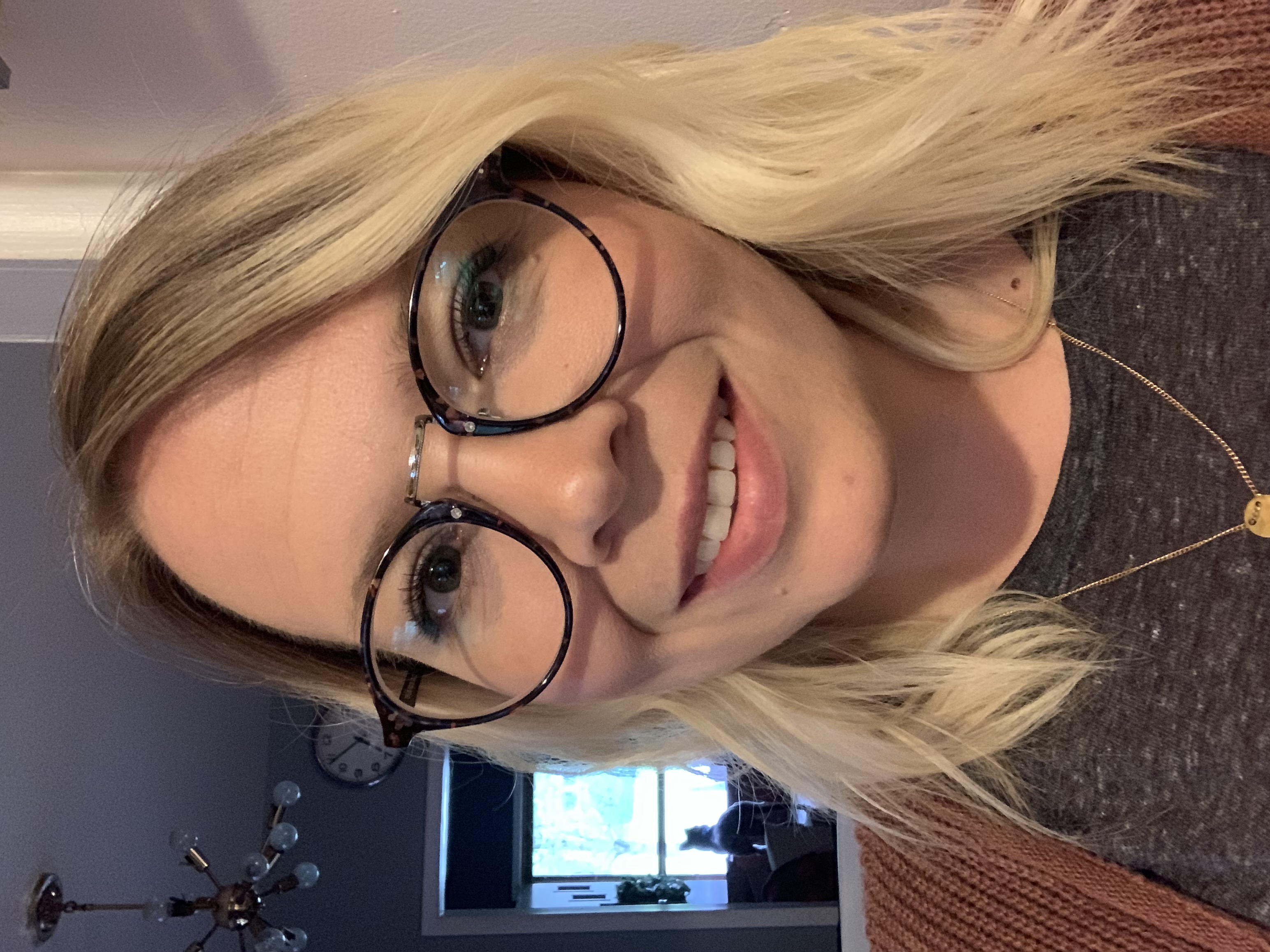 A picture of smiling librarian Ms. Wendy